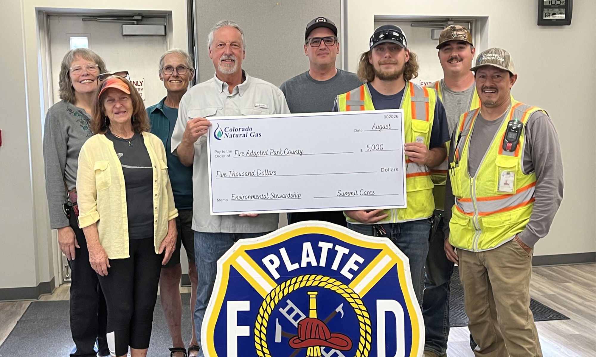 Colorado Natural Gas presents a $5,000 Summit Cares grant to Fire Adapted Park County
