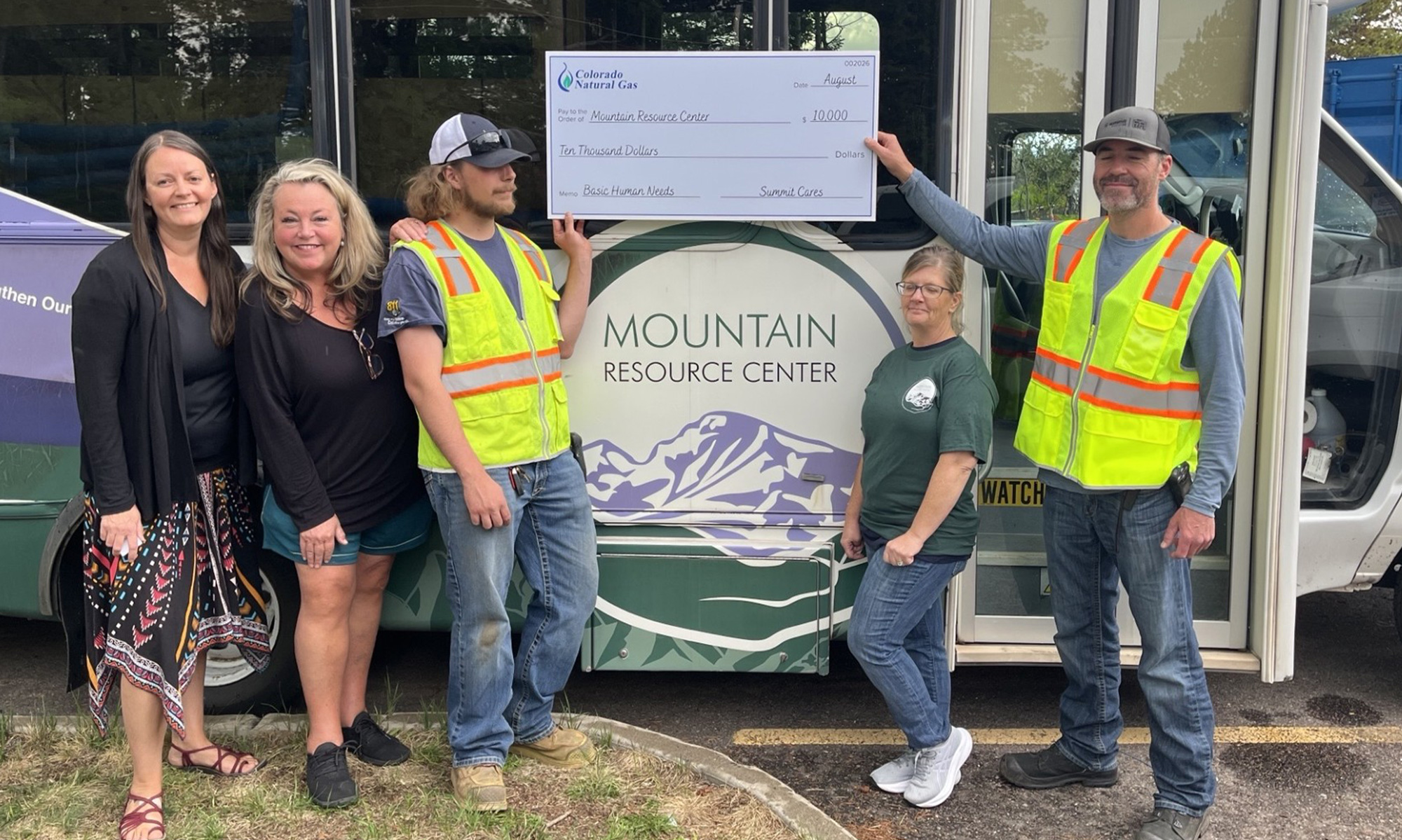 Colorado Natural Gas presents a $10,000 Summit Cares grant to the Mountain Resource Center